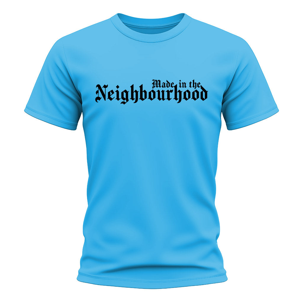 Blue t-shirt with 'Made in the Neighbourhood' text on a white background