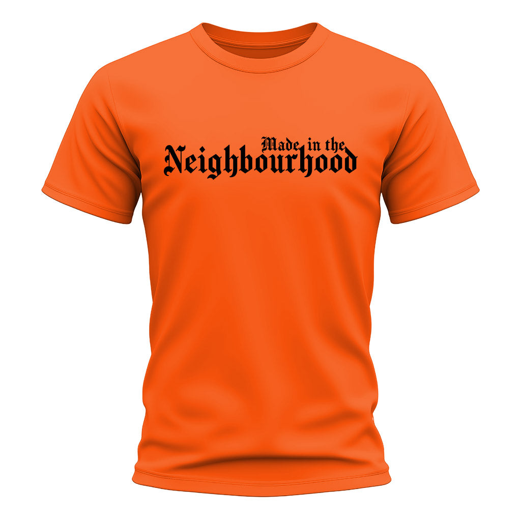 Orange t-shirt with 'Made in the Neighbourhood' text on a white background